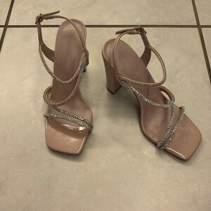 Tan colored shoes with rhinestones, perfect for a wedding